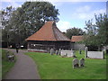 Medieval bell cage at St Mary's Church, East Bergholt in CO7 6TP