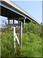 Footpath sign beneath Haddiscoe Bridge in NR31 9HX