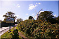Mundesley Village Sign and Stow Mill, Mundesley, Norfolk in NR28 9TG