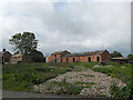 Derelict farm buildings in SY5 9RE
