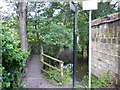 A footbridge over Meanwood Beck, Leeds in LS16 5PR