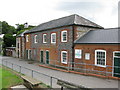 Flint buildings overlooking the recreation ground, Crabble in CT17 0RD