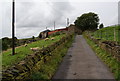 Lane up to Folly Clough Farm in OL13 8NL