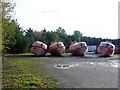 Oil-Rig Lifeboats in storage at Balmuchy in IV20 1ZB
