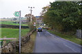 Lane crossing the A676 in BL7 0HR