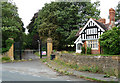 Lodge and gate piers near Chadbury in WR11 4TY