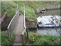 Footbridge over Seaton Burn at Seaton Sluice in NE26 4QU