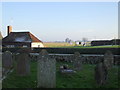 Churchyard and washing, East Chiltington, East Sussex in East Chiltington