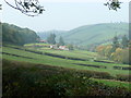 Old farm house and buildings in the Severn Valley west of Llanidloes in SY18 6PQ