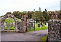 Gates to the "new" part of St Cuthbert's Churchyard in DG6 4XY