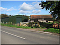 Farm buildings beside the B1140 road to South Walsham in NR13 6DL