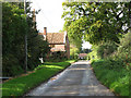 Hemblington Hall Road past Gables Farmhouse in Hemblington