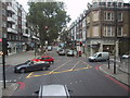 Traffic lights at a crossroads in the Old Brompton Road in SW5 9EG