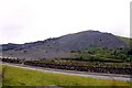 Looking over the A4086 to a slate quarry in LL55 4UD