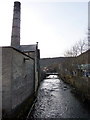 River Calder as it flows past Bee Hive Mills, Hebden Bridge in HX7 6LH