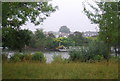 Looking across the River Thames to Surbiton in KT6 4HA