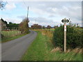 Footpath crosses the lane near Millbank Farm in TN26 2QD