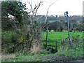 Footpath sign and stile in WF8 3EJ