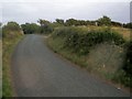 Looking East along the Ridgeway. Triangulation Pillar in field on Right. in Penally Community