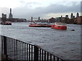 A stormy view of boats on the River Thames, London in SE16 4BD