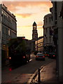 Ryde: bus in Cross Street below a fiery sky in PO33 2JF