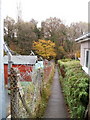 Narrow path from Hobart Close to Coed Melyn Park, Newport in NP20 3NT