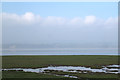 Saltpans, saltmarsh and haze, Littleton Warth in BS35 1NR