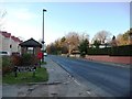 Bus stop, bus shelter and post box in WF8 3SB