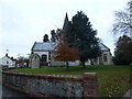 St Lawrence's Churchyard on an evening in late autumn (2) in GU34 1JY