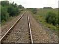 Looking West along railway track in SA70 8LE