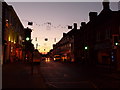 Newport Pagnell: the High Street at dusk in MK16 8EH