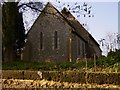 The eastern elevation of Elsted church seen from the footpath in GU29 0JZ