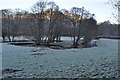 The river Caen winding across fields downstream from Corffe Green bridge in EX33 1BE