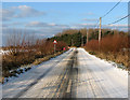 Horsey Road covered in snow in NR29 4DJ