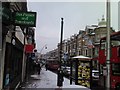 A snowy view of Cranbrook Road in IG1 4HR