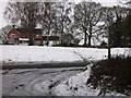 Buildings at Rookery Farm seen from a footpath in GU35 9NJ