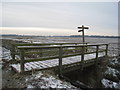 Footbridge and signpost on Crowle Common in DN17 4EZ
