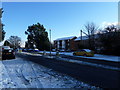 A slushy Havant Road outside St. Andrew's, Farlington in PO6 1DX