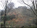 Halton Castle seen, far above, from Main St, Halton in WA7 2SS