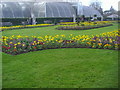 Flowers in front of Palm House, Kew Gardens in TW9 3AB