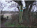 Two Footpath signs in East End Lane, East Bergholt in CO7 6XJ
