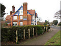 Wangford Road (B1126) past The Randolph public house, Reydon in IP18 6NT
