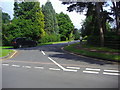 Holtwood Road, at junction with Goldrings Road, Oxshott in KT22 0SZ