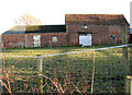 Old barns by Lutton Gate Lodge in PE12 0QG