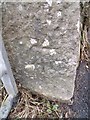 Benchmark on gatepost on the B5110, Llangefni in LL77 7LF