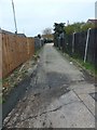Access road to some garages in Merryfield Avenue in PO9 4RT