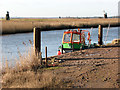 Maintenance boat on the River Bure below Marsh Farm in NR29 3EH