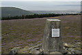 Triangulation Pillar on Foel Fynyddau with Mumbles Head in the background in SA12 9YD