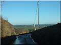 Road descending to Clyst St Lawrence in EX15 2NR