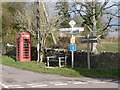 Chilfrome: telephone box and signposts in DT2 0HA